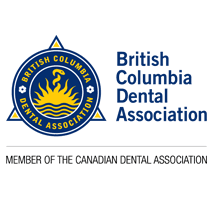 British Columbia Dental Association – Member of the Canadian Dental Association British Columbia Dental Association logo with a yellow sun emblem and blue text, indicating membership in the Canadian Dental Association
